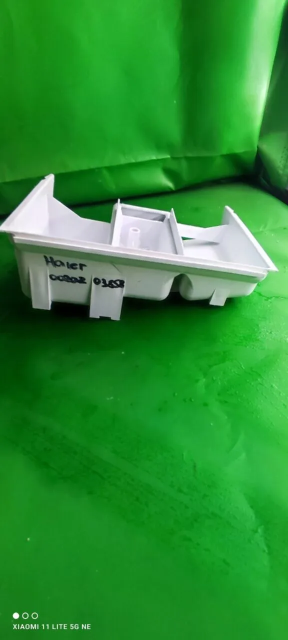 Лоток порошкоприемника Haier 0020203858