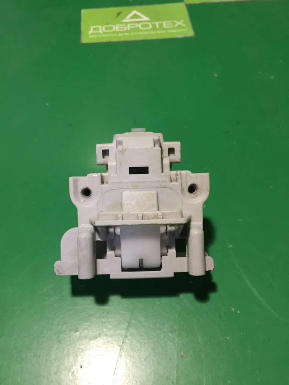 Замок дверцы Indesit Ariston C00087440 для ПММ