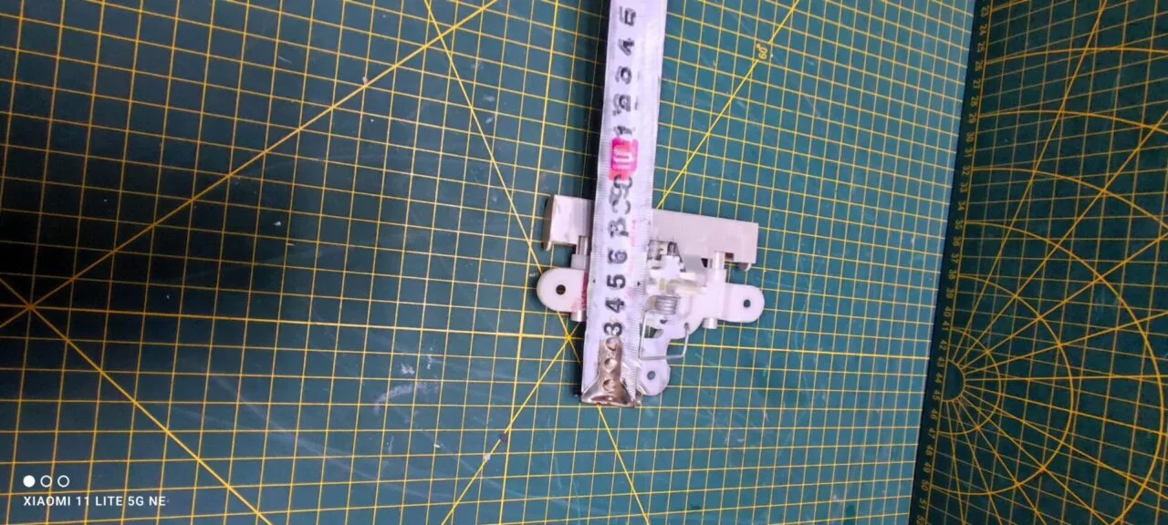 Ручка люка Electrolux 1085341 сер. вертик.загрузка