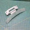 Петля люка Indesit C00255430