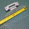 Петля люка Indesit C00255430