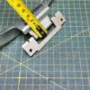 Петля люка Indesit C00255430
