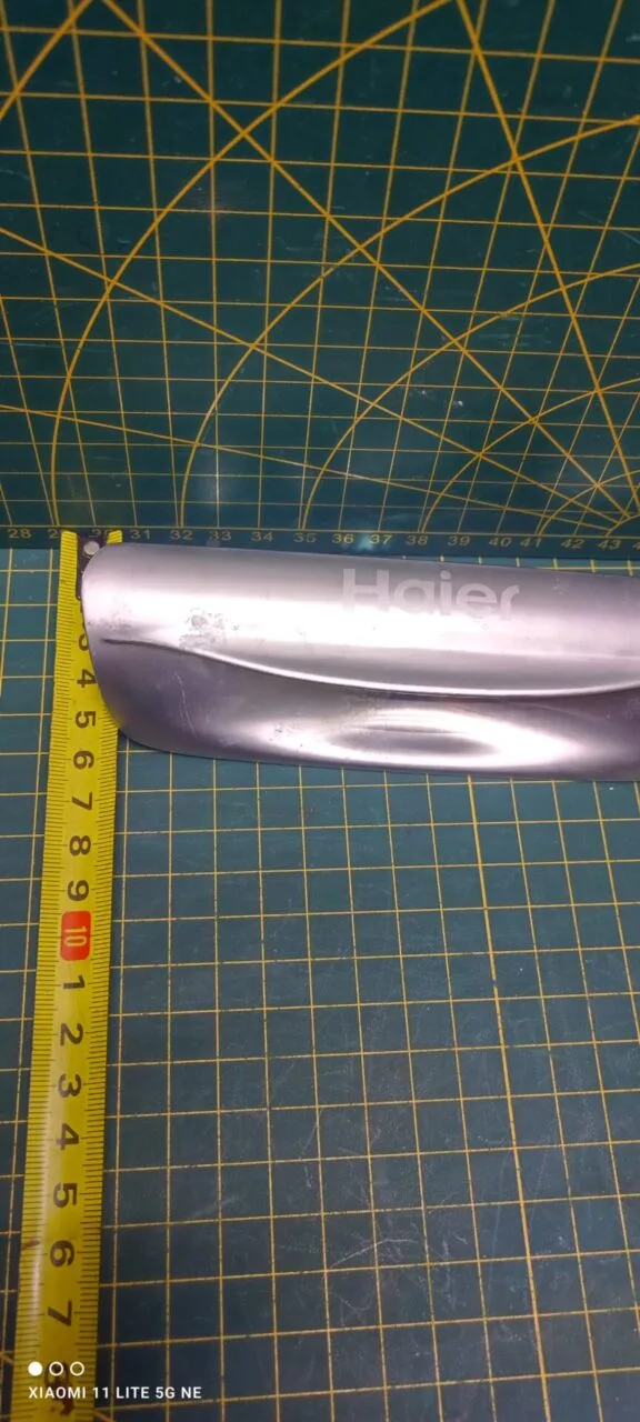 Ручка люка вертикалки Haier 91104539