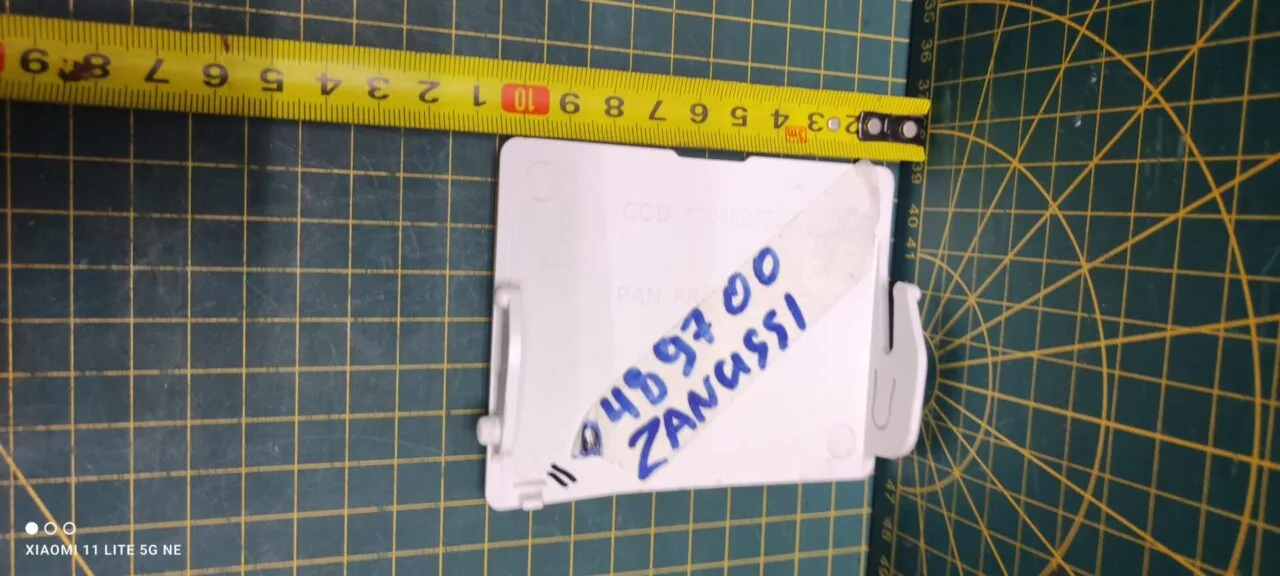 Панель сливного фильтра Zanussi 110469700 к стиральной машине