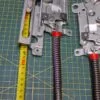 Петли Electrolux 4055150280 Фиол. пара лев+правая для пмм