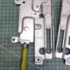 Петли Electrolux 4055147161 Желт. пара лев+правая для пмм