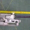Петля Electrolux 4055316964 фиол.  для пмм