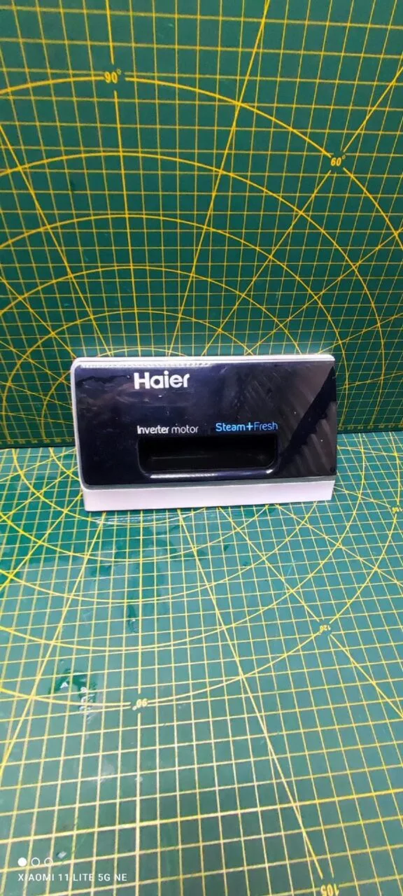 Панель порошкоприемника Haier 0020206874