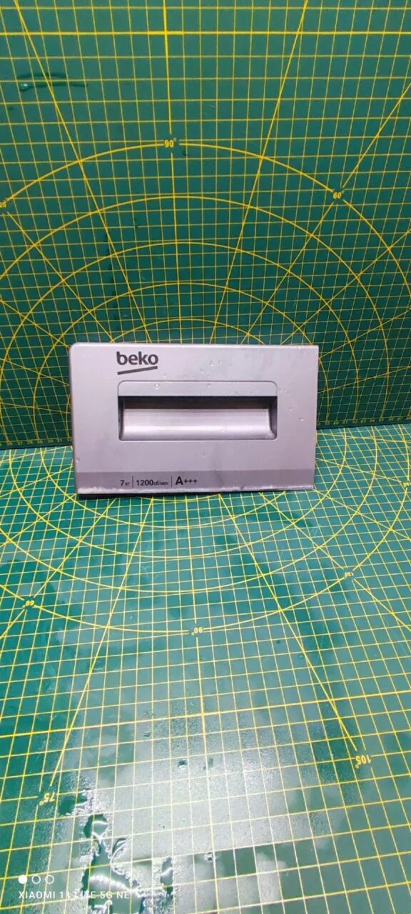 Панель порошкоприемника Beko 285077-02 7/1200 сер/7