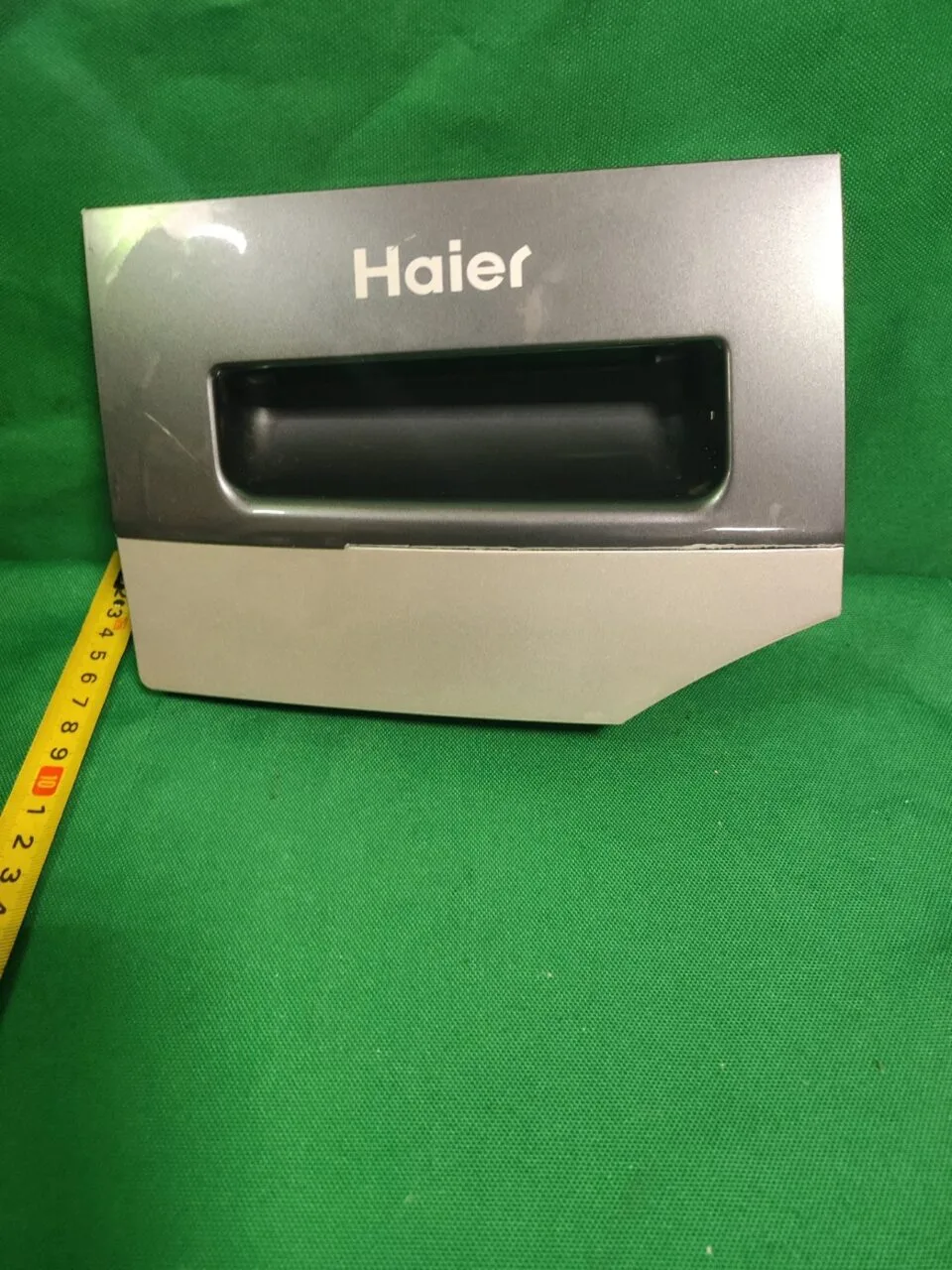Панель порошкоприемника Haier V 27306