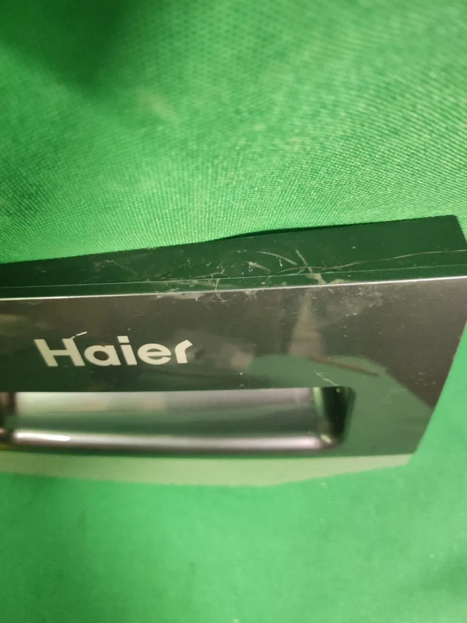 Панель порошкоприемника Haier V 27306