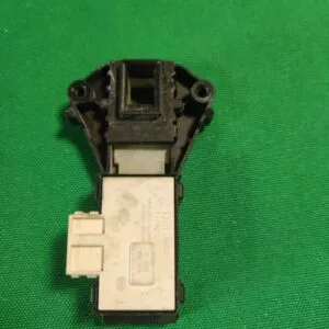 Замок люка (УБЛ) Ariston 2589938Q Замок люка (УБЛ) Ariston 2589938Q