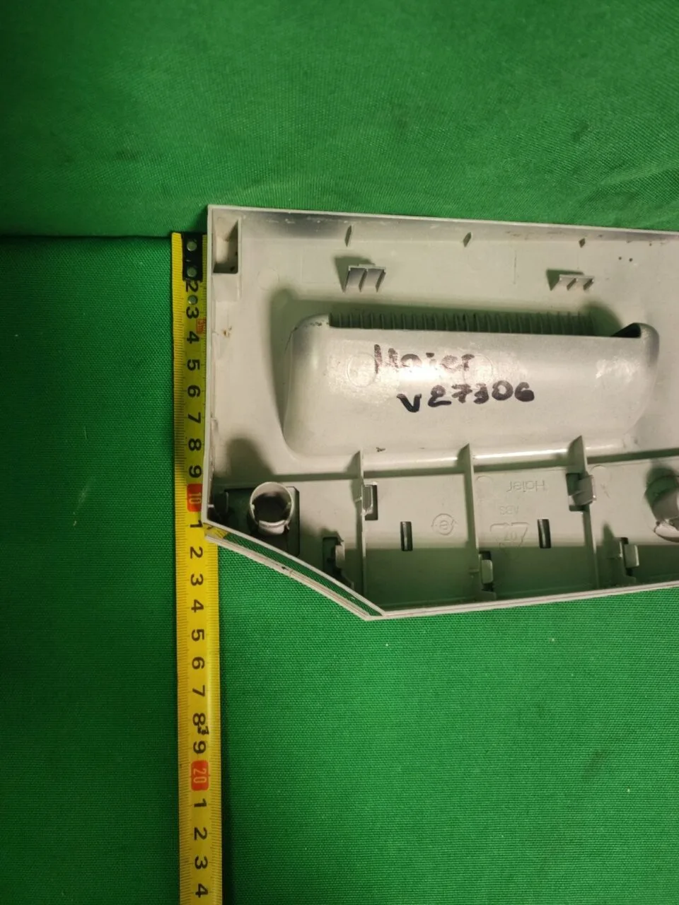 Панель порошкоприемника Haier V 27306