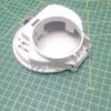 Панель сливного фильтра Haier 0020206591 ( серебро) к стиральной машине