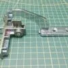 Петля люка Miele 4240202 (левая) к вертикальной стиральной машине Петля люка Miele 4240202 (левая) к вертикальной стиральной машине