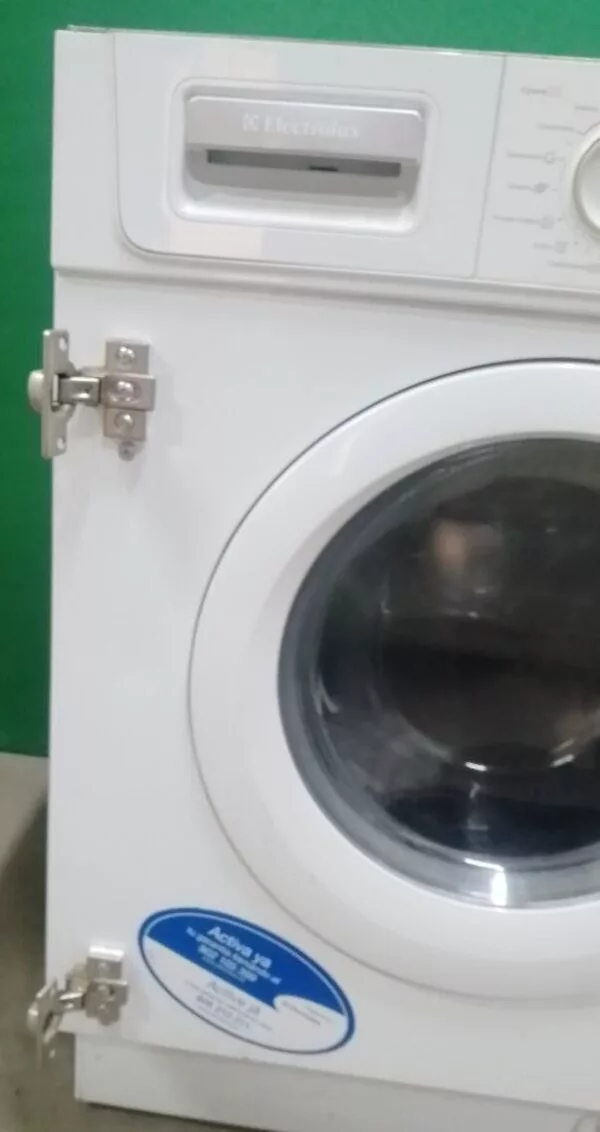 Стиральная машина встраиваемая с сушкой Electrolux EWX1455OW (5-6кг.)