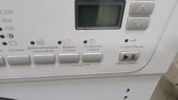 Стиральная машина встраиваемая с сушкой Electrolux EWX1455OW (5-6кг.)