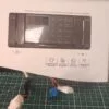 Панель LG F1294ND с дефектом пластика